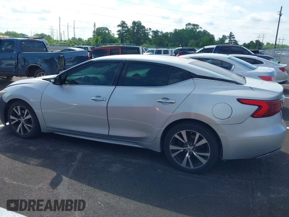 2017 Nissan Maxima SR with VIN 1N4AA6APXHC426651, listed as a IAAI auction lot 42242002 with 155,824 mi miles and . Bid and sale history available at DreamBid. Image 14.