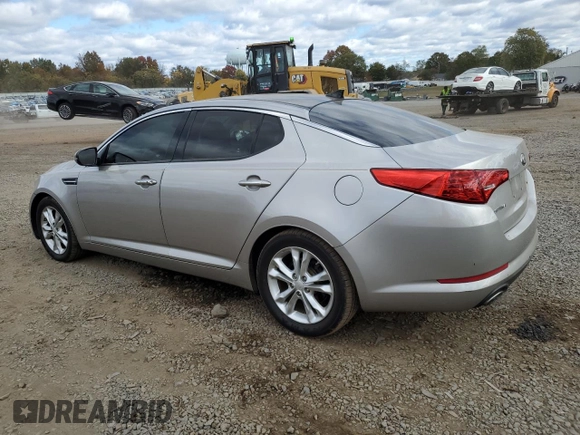 2013 Kia Optima EX с VIN 5XXGN4A71DG231996, выставлен на аукционе Copart как лот 75771594 с пробегом 135 278 миль миль и Списание • Salvage title. История ставок и продаж доступна на DreamBid. Изображение 2.