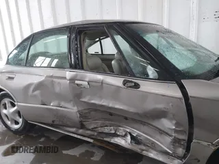 1996 Oldsmobile LSS z VIN 1G3HY5217T4809863, wystawiony jako IAAI lot #41623766 z przebiegiem 186 701 mil mil oraz . Historia ofert i sprzedaży dostępna na DreamBid. Obrazek 13.