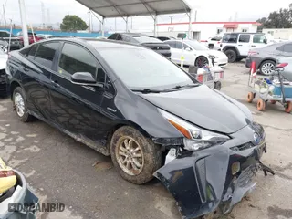 2019 Toyota Prius L Eco with VIN JTDKARFU6K3074058, listed as a IAAI auction lot 41741499 with 70,834 mi miles. Bid and sale history available at carsss.com. Image 1.