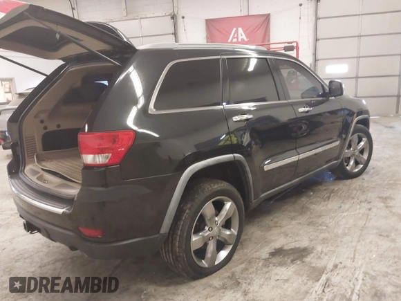 2012 Jeep Grand Cherokee Limited with VIN 1C4RJEBG4CC129194, listed as a IAAI auction lot 41168750 with 184,077 mi miles. Bid and sale history available at carsss.com. Image 4.