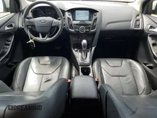 2017 Ford Focus Titanium with VIN 1FADP3N24HL206365, listed as a Copart auction lot 63199965 with 51,435 mi miles and Salvage title. Bid and sale history available at DreamBid. Image 8.