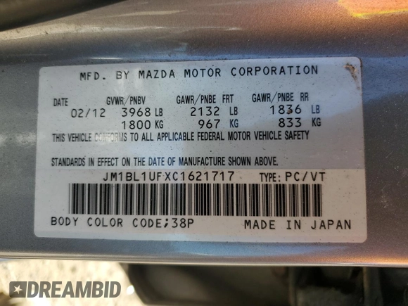 2012 Mazda 3 i Sport z VIN JM1BL1UFXC1621717, wystawiony jako Copart lot #54378805 z przebiegiem Nie podano mil oraz Szkoda całkowita • Salvage title. Historia ofert i sprzedaży dostępna na DreamBid. Obrazek 13.