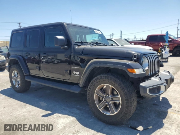 2020 Jeep Wrangler Unlimited Sahara with VIN 1C4HJXEN9LW247869, listed as a Copart auction lot 62697245 with 100,982 mi miles and Salvage title. Bid and sale history available at DreamBid. Image 4.