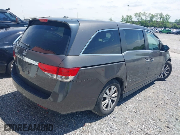 2014 Honda Odyssey EX-L with VIN 5FNRL5H6XEB111412, listed as a IAAI auction lot 41917361 with 210,841 mi miles and . Bid and sale history available at carsss.com. Image 4.