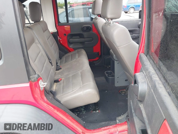2007 Jeep Wrangler Unlimited X with VIN 1J4GB39157L108803, listed as a IAAI auction lot 41894435 with 46,654 mi miles and . Bid and sale history available at DreamBid. Image 8.