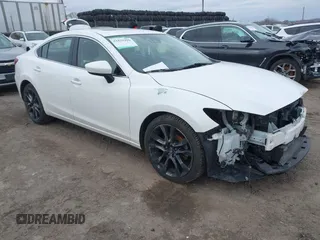 2016 Mazda 6 i Grand Touring with VIN JM1GJ1W54G1485851, listed as a IAAI auction lot 41629410 with 91,327 mi miles. Bid and sale history available at carsss.com. Image 1.