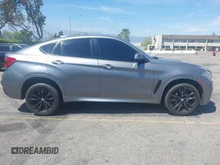 2018 BMW X6 xDrive35i z VIN 5UXKU2C51J0X50913, wystawiony jako IAAI lot #42078443 z przebiegiem Nie podano mil oraz . Historia ofert i sprzedaży dostępna na DreamBid. Obrazek 12.