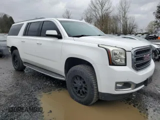 2017 GMC Yukon XL SLT with VIN 1GKS2GKC2HR151954, listed as a Copart auction lot 49005915 with 107,241 mi miles and Clean Title. Bid and sale history available at carsss.com. Image 4.