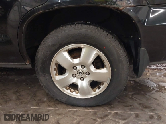 2004 Acura MDX with VIN 2HNYD18254H511752, listed as a IAAI auction lot 41387382 with 217,074 mi miles. Bid and sale history available at carsss.com. Image 12.