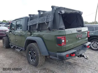 2021 Jeep Gladiator Rubicon with VIN 1C6JJTBG6ML619775, listed as a IAAI auction lot 41304732 with 37,731 mi miles. Bid and sale history available at carsss.com. Image 3.