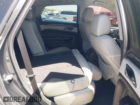 2014 Cadillac SRX z VIN 3GYFNAE35ES610751, wystawiony jako IAAI lot #41832296 z przebiegiem 133 293 mil mil oraz . Historia ofert i sprzedaży dostępna na DreamBid. Obrazek 8.