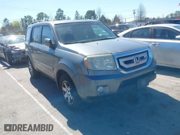 2010 Honda Pilot Touring with VIN 5FNYF4H94AB031167, listed as a IAAI auction lot 41800738 with 184,126 mi miles and . Bid and sale history available at carsss.com. Image 1.