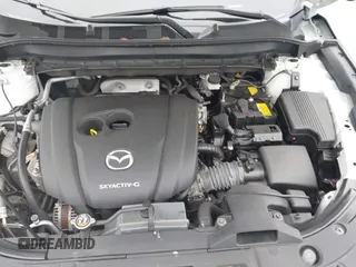 2021 Mazda CX-5 Touring with VIN JM3KFBCM1M1446313, listed as a IAAI auction lot 41930330 with 28,610 mi miles. Bid and sale history available at carsss.com. Image 10.