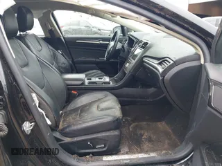 2020 Ford Fusion Titanium with VIN 3FA6P0D9XLR174523, listed as a IAAI auction lot 42100113 with 100,602 mi miles and . Bid and sale history available at DreamBid. Image 5.
