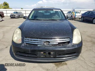 2004 Infiniti G35 w/Leather with VIN JNKCV51E44M111170, listed as a Copart auction lot 72081224 with 219,844 mi miles and Salvage Title. Bid and sale history available at DreamBid. Image 5.
