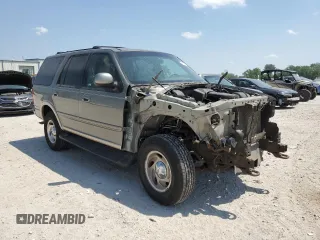 1999 Ford Expedition XLT z VIN 1FMPU18L0XLC03675, wystawiony jako Copart lot #56721435 z przebiegiem 111 652 mil mil oraz Szkoda całkowita • Salvage title. Historia ofert i sprzedaży dostępna na DreamBid. Obrazek 4.