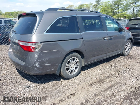 2012 Honda Odyssey EX-L with VIN 5FNRL5H69CB067867, listed as a IAAI auction lot 42225228 with Not provided miles and . Bid and sale history available at DreamBid. Image 4.