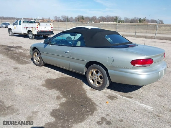 1999 Chrysler Sebring Jxi with VIN 3C3EL55H6XT603058, listed as a IAAI auction lot 41774322 with 157,852 mi miles. Bid and sale history available at carsss.com. Image 3.