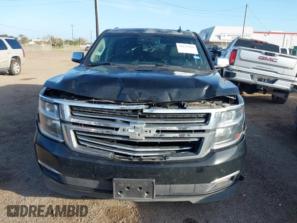 2016 Chevrolet Suburban LTZ with VIN 1GNSCJKC9GR212874, listed as a IAAI auction lot 41125926 with 82,714 mi miles and . Bid and sale history available at DreamBid. Image 12.