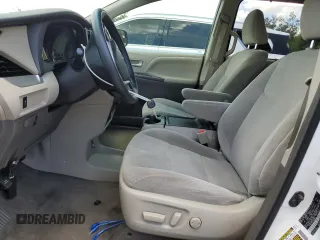 2015 Toyota Sienna LE AAS with VIN 5TDKK3DC1FS660904, listed as a Copart auction lot 61418275 with 132,056 mi miles and Salvage title. Bid and sale history available at DreamBid. Image 7.