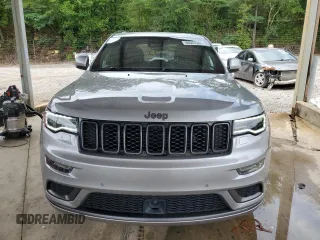 2018 Jeep Grand Cherokee High Altitude with VIN 1C4RJFCT8JC344110, listed as a Copart auction lot 60257065 with 94,917 mi miles and Salvage title. Bid and sale history available at DreamBid. Image 5.