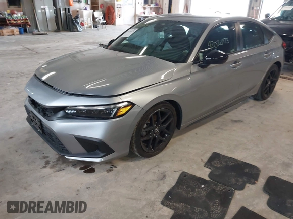 2023 Honda Civic Sport with VIN 19XFL2H80PE010679, listed as a IAAI auction lot 42026973 with 25,701 mi miles and . Bid and sale history available at DreamBid. Image 2.