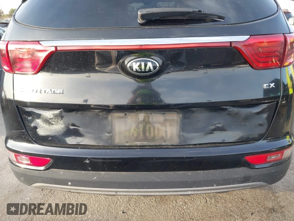 2018 Kia Sportage EX with VIN KNDPN3AC5J7427306, listed as a IAAI auction lot 41598354 with 46,829 mi miles and . Bid and sale history available at DreamBid. Image 6.