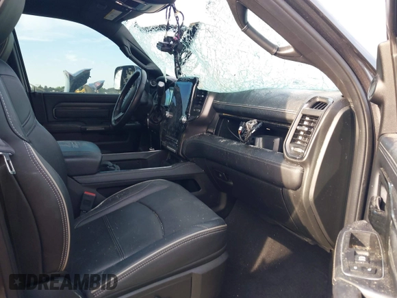 2022 Ram 2500 Limited with VIN 3C6UR5TL9NG195293, listed as a IAAI auction lot 42023716 with 48,702 mi miles and . Bid and sale history available at DreamBid. Image 5.