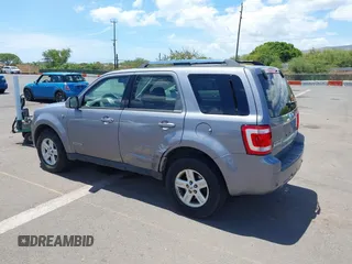 2008 Ford Escape Hybrid z VIN 1FMCU49HX8KC68082, wystawiony jako IAAI lot #42806471 z przebiegiem 104 848 mil mil oraz . Historia ofert i sprzedaży dostępna na DreamBid. Obrazek 6.