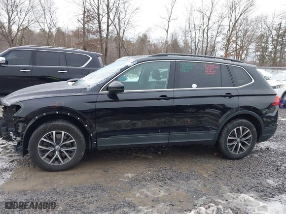 2019 Volkswagen Tiguan SE with VIN 3VV3B7AX2KM196407, listed as a IAAI auction lot 40993730 with 86,904 mi miles. Bid and sale history available at carsss.com. Image 14.