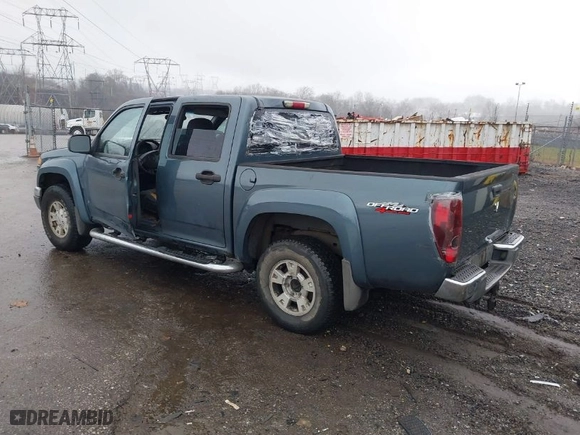 2006 GMC Canyon SLT with VIN 1GTDT136668295937, listed as a IAAI auction lot 41127322 with 214,995 mi miles. Bid and sale history available at carsss.com. Image 3.