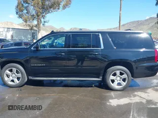 2017 Chevrolet Suburban LS z VIN 1GNSCGKC1HR338621, wystawiony jako IAAI lot #41696381 z przebiegiem 194 687 mil mil oraz . Historia ofert i sprzedaży dostępna na DreamBid. Obrazek 15.