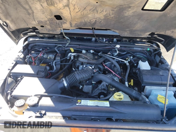 2007 Jeep Wrangler Unlimited Sahara with VIN 1J4GA59197L141821, listed as a Copart auction lot 76897044 with 124,070 mi miles and Salvage title. Bid and sale history available at DreamBid. Image 12.