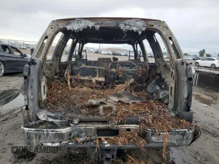 2003 Chevrolet Tahoe LS z VIN 1GNEC13T23J285248, wystawiony jako Copart lot #82634824 z przebiegiem Nie podano mil oraz Nie do naprawy • Non repairable. Historia ofert i sprzedaży dostępna na DreamBid. Obrazek 6.