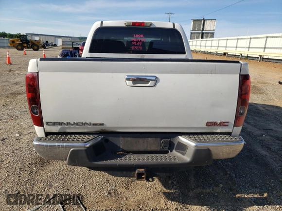 2012 GMC Canyon SLE1 with VIN 1GTD5MFE5C8122405, listed as a Copart auction lot 57487275 with 273,178 mi miles and Clean title. Bid and sale history available at DreamBid. Image 6.