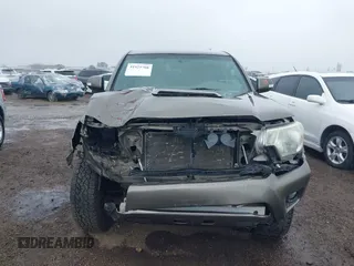 2014 Toyota Tacoma with VIN 5TFLU4EN6EX104410, listed as a IAAI auction lot 41925708 with 189,375 mi miles. Bid and sale history available at carsss.com. Image 13.