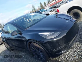 2022 Tesla Model Y Performance with VIN 7SAYGDEF0NF406262, listed as a IAAI auction lot 41132514 with 27,171 mi miles. Bid and sale history available at carsss.com. Image 14.