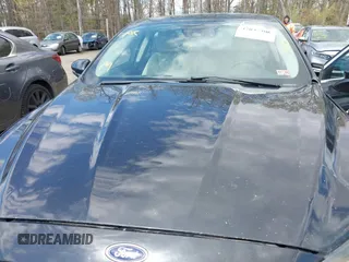 2015 Ford Fusion Titanium with VIN 3FA6P0D99FR300200, listed as a IAAI auction lot 42037306 with 232,095 mi miles. Bid and sale history available at carsss.com. Image 10.