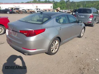 2013 Kia Optima EX z VIN 5XXGN4A76DG200422, wystawiony jako IAAI lot #42067904 z przebiegiem 278 808 mil mil oraz . Historia ofert i sprzedaży dostępna na DreamBid. Obrazek 4.