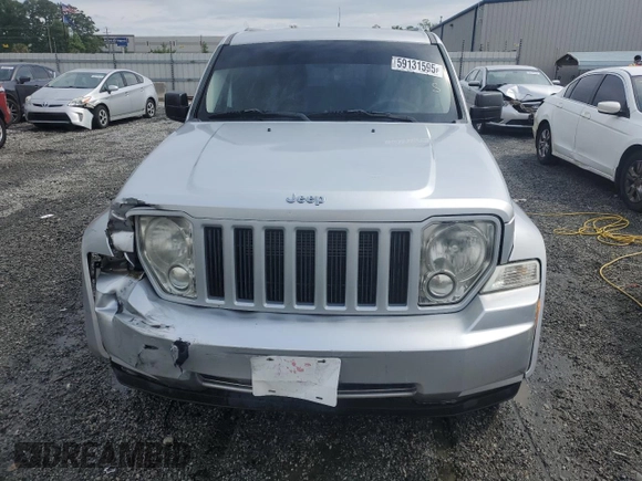 2011 Jeep Liberty Sport with VIN 1J4PN2GK4BW543087, listed as a Copart auction lot 59131595 with 127,989 mi miles and Salvage title. Bid and sale history available at DreamBid. Image 5.
