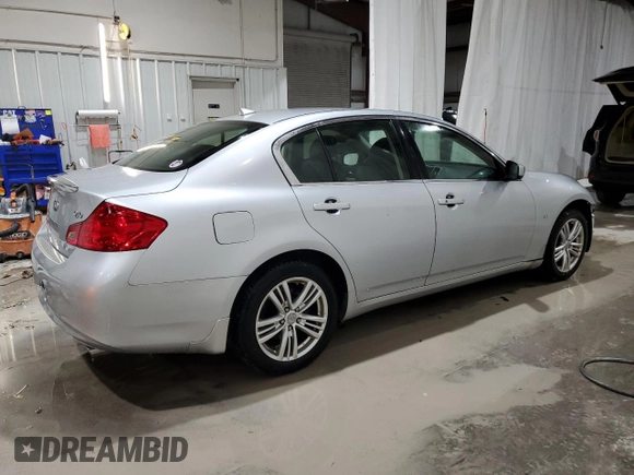 2015 Infiniti Q40 with VIN JN1CV6AR3FM651013, listed as a Copart auction lot 74568404 with 171,155 mi miles and Salvage Title. Bid and sale history available at carsss.com. Image 3.