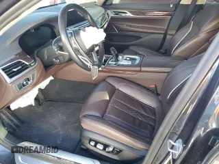 2020 BMW 7 Series 750i xDrive with VIN WBA7U2C05LGM27144, listed as a Copart auction lot 77827854 with 0 mi miles and Salvage Title. Bid and sale history available at carsss.com. Image 7.