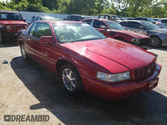2000 Cadillac Eldorado Touring ETC z VIN 1G6ET129XYU191433, wystawiony jako Copart lot #58108224 z przebiegiem 76 957 mil mil oraz Szkody całkowita. Historia ofert i sprzedaży dostępna na DreamBid. Obrazek 4.