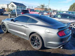 2021 Ford Mustang GT z VIN 1FA6P8CF9M5117126, wystawiony jako IAAI lot #41647619 z przebiegiem 31 076 mil mil oraz . Historia ofert i sprzedaży dostępna na DreamBid. Obrazek 3.