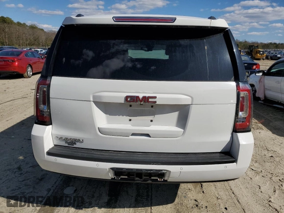 2015 GMC Yukon SLT with VIN 1GKS2BKC4FR143581, listed as a Copart auction lot 50591645 with 0 mi miles and Salvage Title. Bid and sale history available at carsss.com. Image 6.