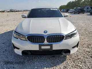 2022 BMW 3 Series 330e with VIN 3MW5P7J03N8C66082, listed as a Copart auction lot 50627595 with 70,799 mi miles and Salvage Title. Bid and sale history available at carsss.com. Image 5.
