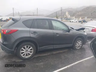 2016 Mazda CX-5 Touring with VIN JM3KE2CY7G0630056, listed as a IAAI auction lot 41817525 with 97,844 mi miles and . Bid and sale history available at DreamBid. Image 13.
