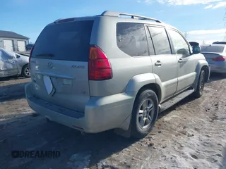 2003 Lexus GX 470 with VIN JTJBT20XX30015034, listed as a IAAI auction lot 41386690 with 234,983 mi miles. Bid and sale history available at carsss.com. Image 4.