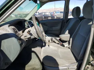 2000 Suzuki Vitara JX z VIN 2S3TD52V1Y6108459, wystawiony jako Copart lot #75526644 z przebiegiem 263 433 mil mil oraz Szkody całkowita. Historia ofert i sprzedaży dostępna na DreamBid. Obrazek 7.